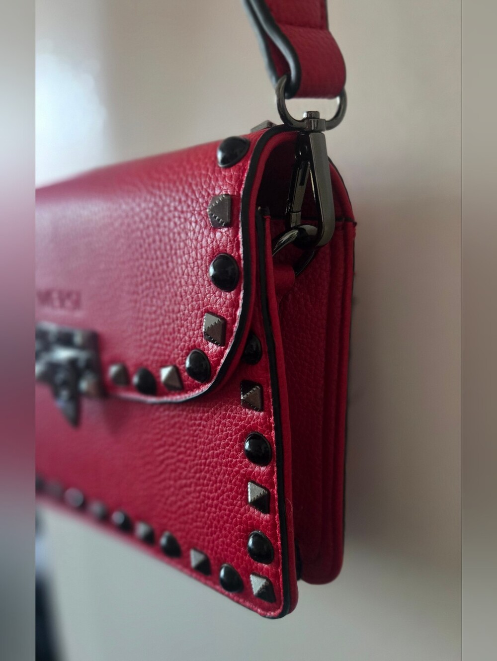 MERSI's coveted Ruby Red Studded Crossbody Bag with Multicolor Geo Strap - Picture 4 of 8